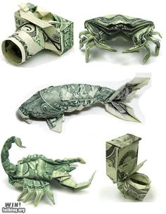 origami fish, crab, dollar bill and other items made out of paper