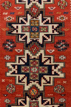 Caucasian Chichi Rug – A Starry Wonder from Azerbaijan Step into the world of Caucasian artistry with this vibrant Chichi rug, featuring six lesghi stars against a bold red background. Surrounded by colourful geometric motifs, including flowers, diamonds, and combs, this rug is a true masterpiece from the Kuba district of Azerbaijan. Bring a piece of Caucasian history and tradition into your home, and let the rich colours and intricate patterns of this Chichi rug add a touch of vibrancy and cult Dark Brown Background, Room Size Rugs, Colorful Roses, Tabriz Rug, Antique Carpets, Perfect Rug, Azerbaijan, Rugs And Carpet, Rug Material