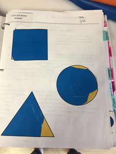 a piece of paper with blue and yellow shapes on it