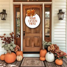 pumpkins and gourds are on the front porch of a house with a sign that says your design here