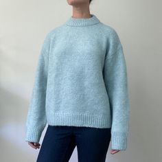 New With Tags, H&M Cozy And Warm Light Blue Mock Turtleneck Oversized Sweater. 90% Recycled Polyester, 5% Wool, 3% Alpaca, 2% Elastane Tag Reads Small, But Could Easily Fit A Medium. Machine Wash Cold, Gentle Cycle Bust: 47" Waist: 45" Length: 23" Sleeve (Pit To Wrist): 18" Relaxed Fit Light Blue Sweater For Winter, Blue Funnel Neck Sweater For Layering, Cozy Blue High Neck Sweater, Blue Relaxed Fit Sweater For Everyday, Cozy Blue Sweater For Everyday, Cozy Blue Everyday Sweater, H&m Winter Sweater For Layering, H&m Winter Layering Sweater, Cozy Crew Neck Sweater From H&m