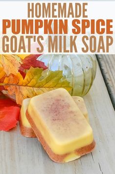 homemade pumpkin spice goat's milk soap on a wooden table next to fall leaves