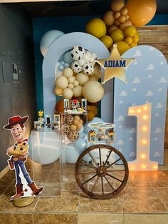 a toy story birthday party with balloons and decorations