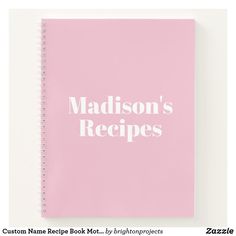 a pink notebook with the words madison's recipes written on it, in white