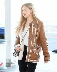 Blackpink Rose Inspired Brown Leather Jacket with Faux Fur Lining The Queen of vocals Blackpink Rose is often seen wearing comfortable and chic high-street fashion outfits. Introducing our Rose inspired brown shearling leather jacket for all our Kpop fans seeking to recreate outfits with a mix of edgy and feminine energy, just like that of Rose. Made from real leather, this jacket is tailored by our skilled craftsmen to ensure high-quality seamless stitching. Our brown shearling leather jacket i Casual Sheepskin Leather Jacket For Winter, Chic Long-sleeve Sheepskin Leather Jacket, Chic Winter Leather Jacket With Pockets, Chic Leather Jacket With Pockets For Winter, Trendy Brown Leather Jacket With Faux Fur Lining, Chic Brown Leather Jacket For Winter, Shearling Leather Jacket, Leather Jacket Women, Rosé Brown