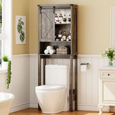 a white toilet sitting in a bathroom next to a wooden shelf filled with bottles and soaps