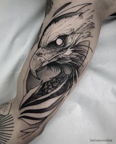 an eagle tattoo on the arm and leg