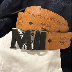 Mcm Claus Reversible Belt. 100% Authentic Belt Buckle Is Used - See Photos Belt Strap Is Brand New Os - Cognac & Black Mcm Belt, M Monogram, Adidas Track Suit, Designer Belt, Reversible Belt, Compression Pants, People Shopping, Monogrammed Leather, Belt Size