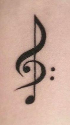 a tattoo with a musical note on it