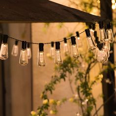 a bunch of light bulbs hanging from a string