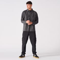 "Our Denim Cargo Overshirt is a versatile layering piece with an oversized fit, button front, two chest pockets, long sleeves, and a point collar. Its edgy vibe can enhance any outfit, whether paired with jeans, chinos, or joggers for a casual look, or a shirt and tie for a smarter appearance. This stylish and functional overshirt is an excellent addition to any man's wardrobe. Product Features: Grey wash Oversized fit Button front fastening 2 Cargo chest pockets Long sleeve Point collar 100% Cotton Our Model is 5'8\" and Wears Size 8. To find the perfect fit for yourself check our Size Guide. Size = S - XXL Chest = 56cm - 66cm Sleeve Length = 63cm - 67cm Total Length = 76cm - 80cm Chest Is Measured Armpit to Armpit.                         Sleeve Length Is Measured Shoulder To Cuff. Casual Collared Shirt With Cargo Pockets, Collared Tops With Cargo Pockets For Streetwear, Casual Shirt With Cargo Pockets And Relaxed Fit, Streetwear Button-up Tops With Cargo Pockets, Casual Button-up Top With Cargo Pockets, Casual Relaxed Fit Shirt With Cargo Pockets, Utility Streetwear Tops With Button Closure, Casual Cotton Shirt With Cargo Pockets, Utility Button-up Shirt For Streetwear