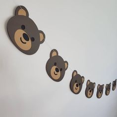 there is a teddy bear banner hanging on the wall