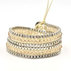 Champagne Crystals on Ivory Leather Wrap Bracelet Adjustable Gold Leather Bracelet Chic Style, Adjustable Gold Leather Chic Bracelet, Adjustable Gold Leather Bracelet For Party, Elegant Gold Leather Bracelet, Elegant Silver Wrap Bracelet, Elegant Silver Leather Bracelet, Elegant Gold Metal Wrap Bracelet, Elegant Silver Adjustable Leather Bracelet, Elegant Silver Leather Bracelet Adjustable