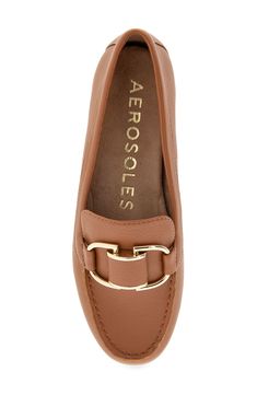 A gleaming buckle stands out at the vamp of a stylish loafer set on a cushioned footbed for lasting comfort. Synthetic upper, lining and sole Imported Flat Loafers With Buckle Closure For Office, Semi-formal Brown Tassel Loafers With Branded Insole, Brown Loafers For Work, Medium Width, Brown Slip-on Tassel Loafers With Leather Sole, Leather Platform Loafers, Medium Width, Brown Semi-formal Tassel Loafers With Leather Sole, Buckle Loafers, The Vamp, Loafer Women