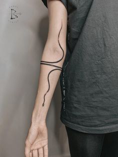 a person with a tattoo on their arm