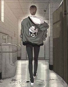 a person walking down a hallway with a skull on the back of their sweatshirts