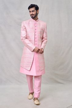 Pink sherwani with geometric embroidery and attached inner kurta. Paired with a trouser. - Aza Fashions Designer Fitted Pink Kurta, Designer Pink Fitted Kurta, Fitted Pink Sherwani With Cutdana, Pink Fitted Sherwani With Cutdana, Designer Pink Sherwani, Fitted Pink Sets With Naqshi Detailing, Designer Fitted Pink Sherwani, Pink Fitted Set With Naqshi Detailing, Designer Fitted Pink Bandhgala