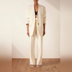 Collarless Oversized Tailored Blazer With Front Button Closure. Material: 79% Polyester, 17% Viscose, 4% Elastane. Collarless Neckline. Padded Shoulders. Single Button Closure. Front Pockets. Single Vent At Back. New Without Tag Bust 45" Knife Pleat, Cream Blazer, Beige Blazer, Shona Joy, Green Blazer, Safari Jacket, Satin Jackets, Tailored Blazer, Oversized Blazer