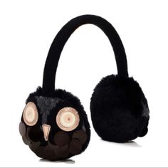 an owl headphone with ear muffs on it