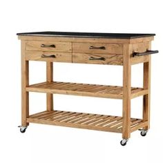 a wooden kitchen island with black top on wheels