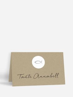 a card with a fish on it and the word taste unnabell written in black ink