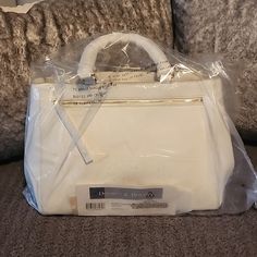 This Is A Nwt, Never Been Out Of The Bag, Protective Foam Still On Dooney And Bourke Handbag. All Of The Tags Are Still Attached. The Registration Card Is Here. Somehow I Ended Up Ordering 2. So... Here's One For You. It's An Awesome Bag (I Should Know, I've Been Using The Other One All Summer). Off White Zip Satchel White Satchel With Dust Bag For On-the-go, White Handheld Bag With Gold-tone Hardware, White Double Handle Satchel For On-the-go, White Handheld Satchel For On-the-go, White Handheld Satchel For Everyday Use, White Satchel With Top Carry Handle For Errands, White Top Handle Satchel For On-the-go, White Tote Satchel, White Bags With Gold-tone Hardware For Errands