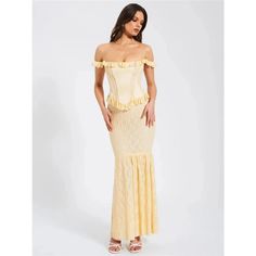 Step into the spotlight with our Yellow Satin Off-Shoulder Lace Corset Maxi Dress, a breathtaking blend of elegance and allure designed to make your evenings unforgettable. This ankle-length gown is tailored to accentuate your silhouette with its bodycon fit and natural waistline, ensuring a look that’s both flattering and chic. Crafted from luxurious polyester and delicate mesh, the dress promises both comfort and style for any upscale event. Special Features Slight stretch fabric for a perfect Gown For Party, Corset Maxi Dress, Maxi Dress Elegant, Bodycon Gown, Dress Stands, Yellow Satin, Backless Design, Lace Corset, Party Gowns