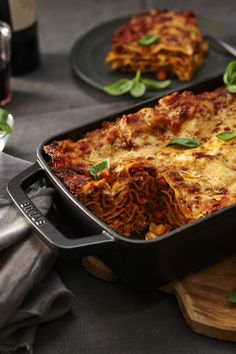 a casserole dish with meat and vegetables in it