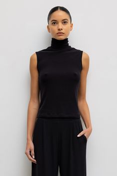 #color_black Sleeveless Turtleneck Drawing, Turtleneck Tank Top Outfit, Styled Turtleneck, Black Turtleneck Sleeveless, Sleeveless Turtleneck Crop Top, Turtleneck Outfits, Turtleneck Tank Top, Sleeveless Turtleneck Sweaters, Black Turtle Neck