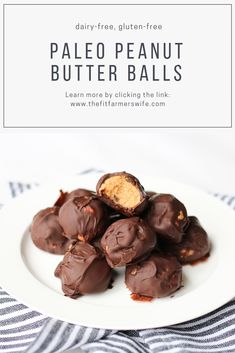 chocolate covered peanut butter balls on a white plate