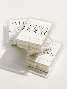 three square coasters sitting on top of each other in front of a white background