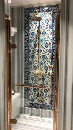 an ornate shower in the middle of a room