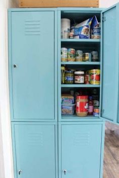 a blue metal cabinet filled with lots of food