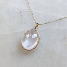 ITEM DESCRIPTION: >>The pendant is made from Solid 14K Yellow Gold. Gemstone used is absolutely natural and ethically sourced. >>Natural Rose Quartz in oval shape with bezel setting is studded on it with utmost precision. >>This is a minimalist design and is absolutely hassle-free and everyday jewelry. Gem: Rose Quartz Gem size: 16x22 mm Gem weight: 14.85 carats Gold purity: 14K (58.33% approx.) Gold weight: 0.58 grams Gross weight: 3.55 grams The Gold purity is guaranteed and it comes with auth Oval Rose Cut Diamond Jewelry In Rose Gold, Rose Gold Oval Jewelry With Bezel Setting, Oval Rose Gold Jewelry With Bezel Setting, Oval Rose Gold Jewelry With Birthstone, Oval Pink Gold Jewelry For Anniversary, Oval Pink Gold Jewelry For Anniversaries, Gold Necklace Pendant, Rose Quartz Jewelry, Rose Quartz Pendant