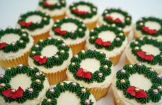 cupcakes decorated with green and red decorations