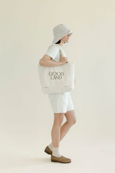 A GOODLAND-branded tote bag for your adventuring needs. Made out of 100% natural unbleached cotton canvas, it’s the perfect companion for a day by the water, an afternoon wandering through a farmer’s market, or simply for your day-to-day errands. 

Our GOODLAND All-Day Tote is approx. 14.5” x 14” x 4.5”—a generous size for carrying all your essentials.
 Natural Unbleached Cotton: 14.5" x 14.5" Branded Tote Bags, Men's Summer Style, Womens Clothing Patterns, Preppy Style Summer, A Farmer, Spring Summer 2023, Human Experience, Seasonal Fashion, Summer Outfits Women