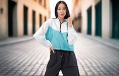 This cropped windbreaker is the perfect solution for athletes looking to take their training to the next level. With its lightweight, waterproof construction, side-slit pockets, breathable mesh lining, and adjustable drawcords on the hood and waist, this jacket is designed to keep you dry and comfortable in any kind of weather. ITEM DETAILS: ≫ 100% polyester ≫ Breathable mesh lining, reduces static ≫ Water-resistant ≫ Elastic cuffs ≫ Adjustable drawcords on the hood and waist ≫ Half-zippable fro Cropped Windbreaker, Unique Workouts, Running Jacket, Next Level, Rain Jacket, The Next, Take That, Mesh, Running