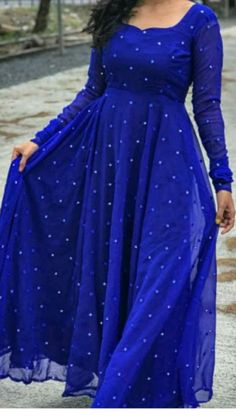 Rs.950/- Prepaid Only. WhatsApp No:9361617309  *Party wear Mirror Work Royal Blue gown*  Featuring Solid georgette maxi Dress This is made for simple casual dressing with subtle detailing! Hurry, get yours now! The dress has mirror all-around 😍   *Fabric:- Georgette with attached Inner*   Sizes:-   M-38   • L-40  • XL-42  • XXL-44  *Length: 50+”*  Flare:- 4 mtr 🤩 Long Frock Models, Floral Long Frocks, Long Anarkali Gown, Georgette Maxi Dress, डिजाइनर कपड़े, Indian Dresses For Women, Frocks And Gowns