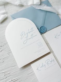 the wedding stationery is laid out and ready to be used