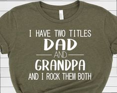 a t - shirt that says i have two titles dad and grandpa and i rock them both