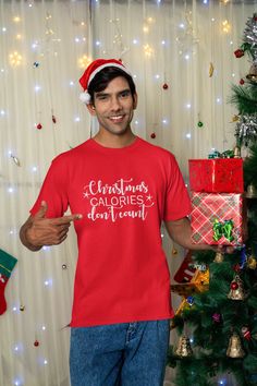 Introducing our hilarious Christmas Calories Don't Count shirt, the perfect gift for those who love to indulge during the holiday season! This funny and festive shirt will bring laughter to any Christmas gathering, reminding everyone that sometimes, counting calories can take a backseat to enjoying scrumptious treats. Made with the highest quality materials, this shirt is not only comfortable but also durable, ensuring it will last through countless seasons of holiday cheer. Whether you're shopp Grinch Shirt, Grinch Shirts, Christmas Tee Shirts, Merry Christmas Shirts, Festival Shirts, Christmas Tree With Gifts, Family Pajamas, Christmas T Shirt, Christmas Tees