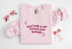 Don't Talk to Me Embroidered Sweatshirt, Y2K Style Embroidered Crewneck, Hurt Feelings Shirt, Gifts for Her, Gifts for Him, Couples Gifts, CozyGenZ - Dark grey sweatshirts will have black threads - Military Green and Maroon sweatshirts will have white threads This Cute Embroidered Don't Talk to Me I'll Hurt Your Feelings Sweatshirt is a must-have for your Valentines' Day or all season wardrobe. Whether you're running errands, going for a walk, attending a concert/party, or staying cozy at home, this unisex sweatshirt is perfect for you! Our crewnecks are made from the highest quality fabric for an incredibly soft and comfortable fit, with advanced printing to ensure that the colors and graphics are vibrant and detailed. ❤ The price is for ONE item only. If you want to order matching shirts Trendy Pink Sweatshirt With Embroidered Graphics, Pink Cotton Sweatshirt With Embroidered Graphics, Pink Long Sleeve Embroidered T-shirt, Pink Embroidered Long Sleeve T-shirt, Long Sleeve Embroidered Pink T-shirt, Concert Party, Don't Talk To Me, Maroon Sweatshirt, Sweatshirt Y2k