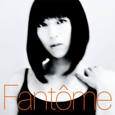 a woman with black hair and bangs in an ad for fantome, which features the word fantome