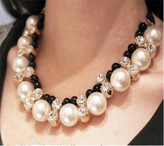 Looking for ladylike classics with a modern twist? Get this ultra-sophisticated Pearl Rhinestone Necklace with Satin Band. Add a vintage flavor with this pearl necklace/choker and make any outfit instantly cooler. Would look lovely on you at weddings, holidays and parties. Lead/Nickel compliant Simple Necklaces, Pearl Statement Necklace, Rhinestone Choker Necklace, Rhinestone Choker, Rhinestone Bridal, Chain Choker Necklace, White Necklace, Pearl Choker, Rhinestone Necklace