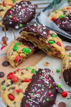 chocolate chip cookies with candy and sprinkles cut in half