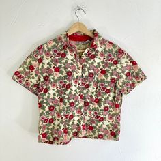 Vintage 90s Yellow Pink Floral Short Sleeve Cropped Blouse Shirt  Button closure with short sleeves and a cropped length Brand - Sun River   Tag size - Medium Seen on size Small Measurements (laying flat) Chest - 20 in Length - 20.5 in #fairygrunge #whimsygoth #floralblouse #cottagecore #babydollshirt Retro Short Sleeve Camp Shirt For Spring, Retro Cotton Cropped Shirt With Short Sleeves, 90s Short Sleeve Tops With Button Closure, Vintage Short Sleeve Shirt With Camp Collar For Spring, Spring Cropped Short Sleeve Shirt, Short Sleeve Cropped Shirt With Button Closure For Spring, Fitted Vintage Short Sleeve Shirt For Spring, Vintage Fitted Short Sleeve Camp Shirt, Vintage Fitted Camp Shirt With Short Sleeves