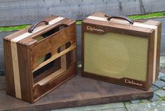 two wooden amps sitting next to each other