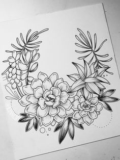 a drawing of flowers and honeycombs on paper