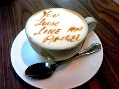 a cappuccino with the words you look like an angel written on it