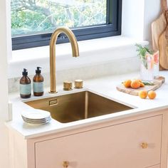 the kitchen sink is clean and ready to be used by someone who likes to wash their hands